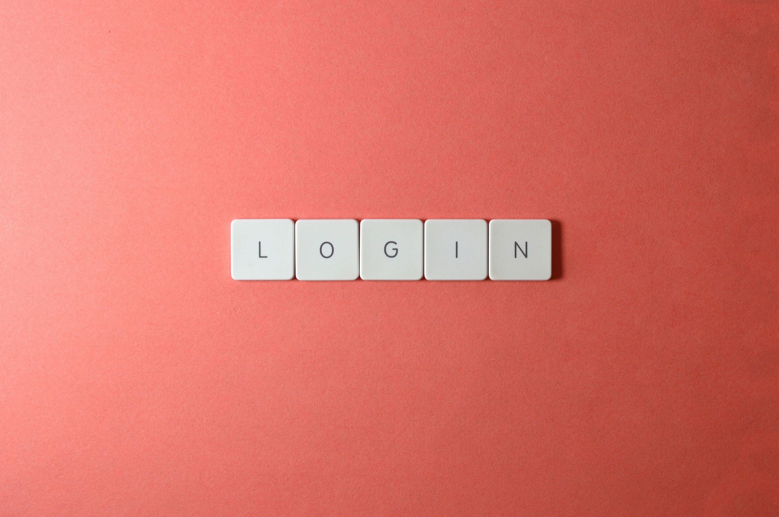 Touches clavier login sur fond corail
